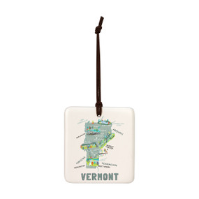A square cream hanging tile magnet ornament with a map illustration of Vermont with landmarks and cities.