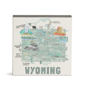 A white square wall art with an illustrated map of Wyoming with landmarks and cities.
