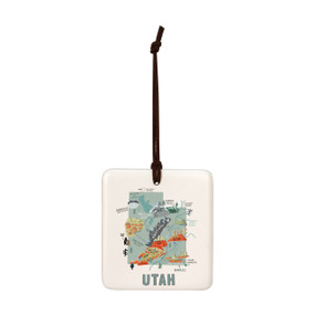 A square cream hanging tile magnet ornament with a map illustration of Utah with landmarks and cities.