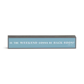 A blue rectangular wall art with the saying "Is the weekend gonna be back soon?"