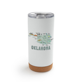 A white cork bottom tumbler with a graphic map image of Oklahoma and illustrations of famous locations and cities.