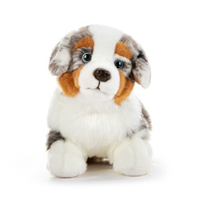 A gray, brown and white plush large Australian Shepherd dog.