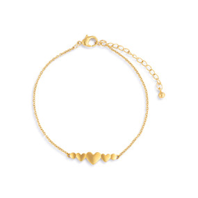 An adjustable gold chain bracelet with a small gold charm of three hearts. The bracelet is waterproof.