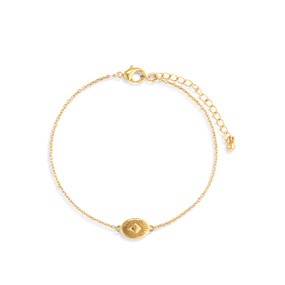 An adjustable gold chain bracelet with a small gold sunburst charm. The bracelet is waterproof.
