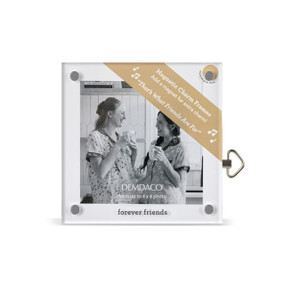 Front facing view of an acrylic magnet musical square frame. he crank for the music box is on the frame's left side. Forever Friends" is printed at the bottom of the frame. A label in the upper left corner states the music box plays "".