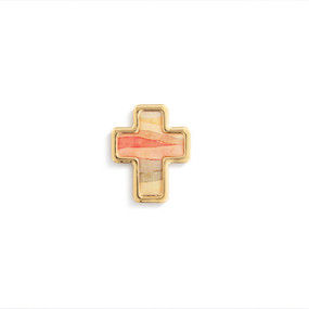 Top down view of a gold cross shaped pin. The surface of the cross is desert sunset scene with gold edging.