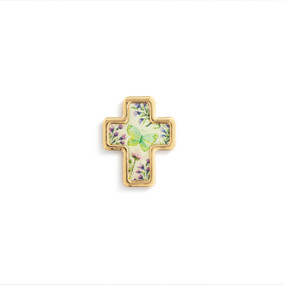 Top down view of a gold cross shaped pin. The surface of the cross is an image of a green butterfly surrounded by purple and pink flowers against a white background with gold edging.