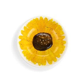 Top down view of a mini ceramic bowl, showing the sunflower design on the interior of the bowl.