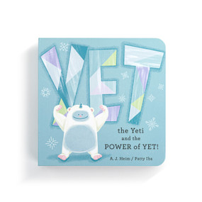 Top down view of the blue and white cover of a Yet the Yeti board book.