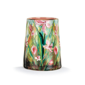 Front facing view of a ceramic vase decorated with pink flowers and green leaves.