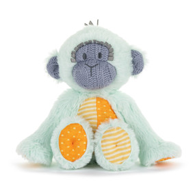 Front view of a light blue plush monkey. The monkey's face and ears are a purple knitted cable pattern, and its chest and feet have orange fabric with stripes and polka dots.