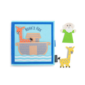 Top down view of the cover of a Noah's Ark activity book, with a felt orange giraffe in the pocket on the left side of the ark. Felt figures of a yellow giraffe and Noah are to the right of the book.