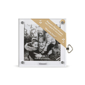 Top down view of a square acrylic musical frame with magnets in each corner. "Blessed" is printed at the bottom. A brown banner in the upper right corner indicates the music box plays "Amazing Grace"..