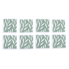 Top down view of four fabric napkins with white leaves printed on a sage green background and white edging, The napkins are arranged in a 2x2 grid and tilted to the left.