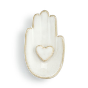 Top down view of a white ceramic trinket dish. The dish is a palm up right hand with a heart at the center of the palm.
