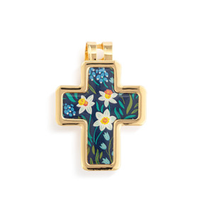 Top down view of a gold cross shaped visor clip. The surface of the cross is a design of daffodils and other flowers against a dark blue background with gold edging.