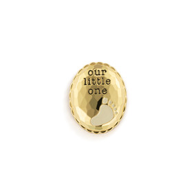 Top down view of an oval gold magnet with a baby footprint at the bottom, with the words "Our Little One" at the top..