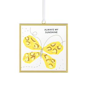 Front view of a clear glass suncatcher in a gold frame with a white cord threaded through a loop hanger on the top. On the surface of the glass is a yellow and brown butterfly. "Always my sunshine" is printed on the upper left corner.