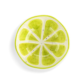 Top down view of a mini ceramic bowl, showing the slice of lime design on the interior of the bowl.
