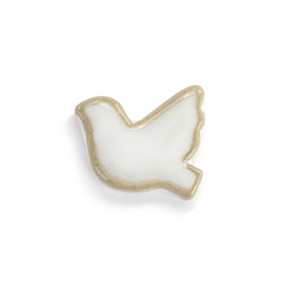 Top down view of a small white dove shaped ceramic token.