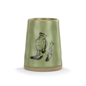 Front facing view of a dark green ceramic vase with an illustration of Winnie the Pooh and Piglet walking.