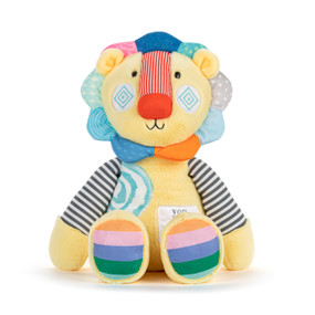 Front view of a plush lion. The lion's body is mostly yellow, with a blue and white spiral on its right shoulder and a patch on its lower left chest.. The mane and feet are rainbow colors. The arms and legs are different colors and patterns.