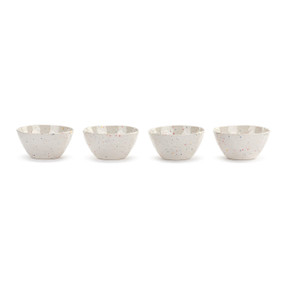 Front view of four melamine snack bowls set in a line. The bowls are white with multicolored dots that resemble confetti.