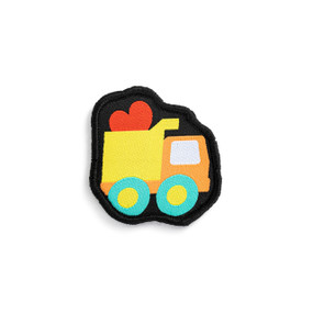 Front view of an irregularly shaped badge. The badge is an orange and yellow dump truck, with a red heart in the back. The badge can be attached to a Just Add Heart Bear.
