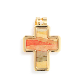 Top down view of a gold cross shaped visor clip. The surface of the cross is desert sunset scene with gold edging.