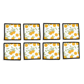 Top down view of four fabric napkins with a citrus orange print and black edging, The napkins are arranged in a 2x2 grid and tilted to the left.