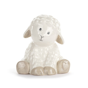 Front facing view of a ceramic piggy bank. The bank is a figure of a white lamb.