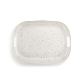 Top down view of a large melamine tray with handles. The tray is white with multicolored dots that resemble confetti.