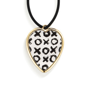 Top down view of the front of a heart shaped gift tag for a wine bottle, strung with a black cord. The heart has a pattern of black Xs and Os on a white background.