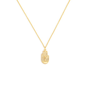 Detail view of a gold chain necklace and pendant. The pendant is a right hand, palm up, with a cross in the center of the palm.