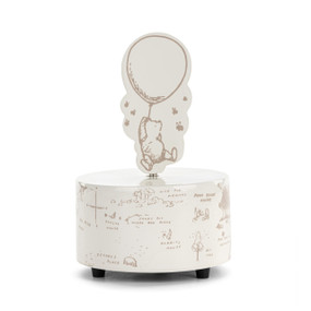 Front view of a rotating Winnie-the-Pooh themed music box. The base features a vintage style map of the Hundred Acre Wood. A figure of Winnie-the-Pooh hanging onto a balloon and surrounded by bees is on top.