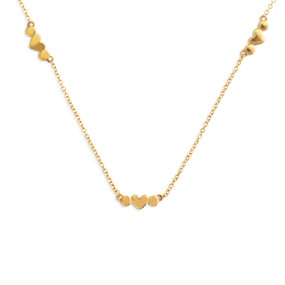 An adjustable gold chain necklace with several small heart charms. The necklace is waterproof.