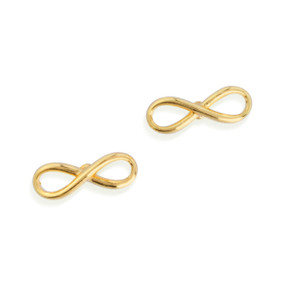 Top down view of a pair of gold post earrings with infinity loop embellishments.