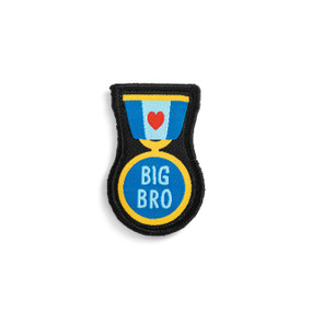 Front view of a badge. The badge is a blue and white medal on a ribbon pin, with a heart on the ribbon. The medal reads "Big Bro". The badge can be attached to a Just Add Heart Bear.