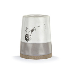 Front facing view of a grey and white ceramic vase with an illustration of Piglet blowing on a dandelion.