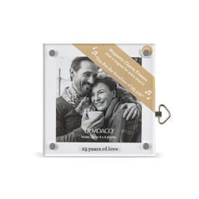 Top down view of a square acrylic musical frame with magnets in each corner. "25 Years of Love" is printed at the bottom. A brown banner in the upper right corner indicates the music box plays "You Are the Sunshine of My Life".