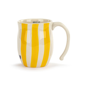 Image of the front of a white and yellow vertically striped ceramic mug, with a small blue heart near the bottom on the left side.The word "smile" is printed in typeface on the mug's interior.The mug's handle is to the right.