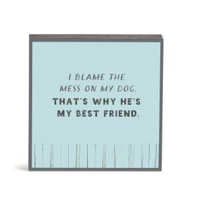 Front view of a square wall art with black sides. "I blame the mess on my dog. That's why he's my best friend." is printed in black on a light blue background.