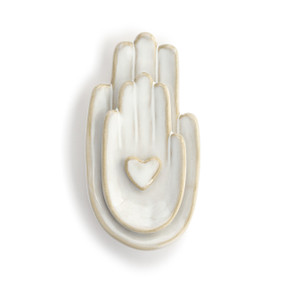 Front view of a wall art piece. The figure is of two right hands nested together, palm up, with the smallest on top. The small hand has a heart in the center of the palm.