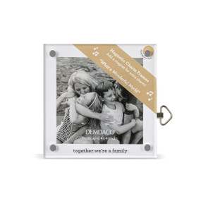 Top down view of a square acrylic musical frame with magnets in each corner. "Together we're a family" is printed at the bottom. A brown banner in the upper right corner indicates the music box plays "What a Wonderful World".