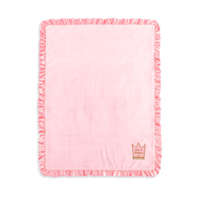 Top down view of a pink baby blanket with pink ruffled trim. The outline of a gold crown is embroidered in the lower right corner.
