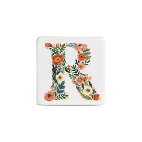 Front view of a square white magnet monogrammed with the letter R. The letter is former with a design of orange flowers and green leaves.
