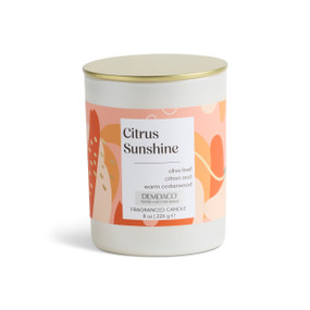 An 8 oz tester citrus sunshine scented candle in a round white container with a gold lid.