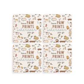Top down view of a set of four white coasters arranged in a two by two grid. "Leave paw prints wherever you go" is printed at the center against a background of small illustrations of different breeds of cats and dogs.