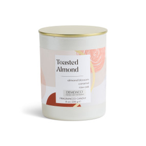 An 8 oz tester toasted almond scented candle in a round white container with a gold lid.