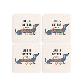 Top down view of a set of four white coasters arranged in a two by two grid featuring an illustration of a Dachshund dog at the center and "Life is better with dogs" printed over the dog.
